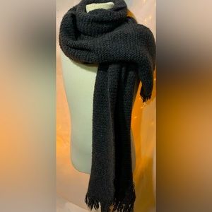 Very warm and cozy knitted scarf. Can be worn with just about anything.